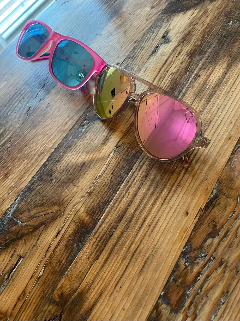 2 sunglasses Goodr and Blenders